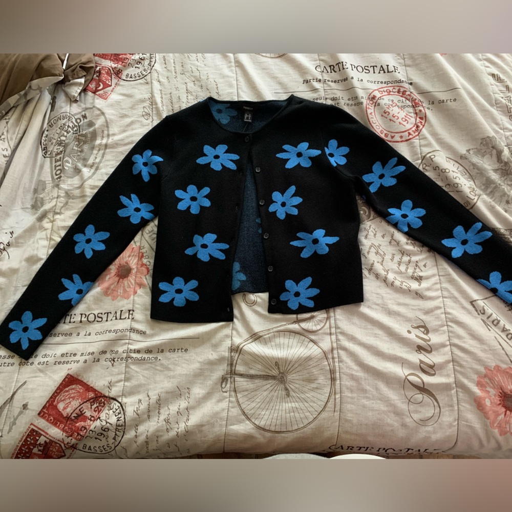 Black sweater with blue flowers